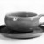 Russel Wright (American, 1904-1976). <em>Cup and Saucer, from 6-Piece Place Setting</em>, Designed 1937; Manufactured ca. 1938. Earthenware, Cup: 2 x 5 x 3 5/8 in. (5.1 x 12.7 x 9.2 cm). Brooklyn Museum, Gift of Andrew and Ina Feuerstein, 80.169.6a-b. Creative Commons-BY (Photo: Brooklyn Museum, 80.169.6a-b_bw.jpg)