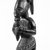 Yorùbá. <em>Kneeling Figure (Eshu-Elegba)</em>, late 19th or early 20th century. Wood, h: 11 in. (28.0 cm). Brooklyn Museum, Gift of Dr. and Mrs. Joel Hoffman, 81.102. Creative Commons-BY (Photo: Brooklyn Museum, 81.102_threequarter_bw.jpg)