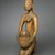 Possibly Maku, master carver of Erin (died 1915). <em>Kneeling Female Figure (Arugba)</em>, early 20th century. Wood, pigment, 22 x 7 x 8 in. (55.9 x 17.8 x 20.3 cm). Brooklyn Museum, Gift of Dr. and Mrs. Robert A. Mandelbaum, 82.103a-b. Creative Commons-BY (Photo: Brooklyn Museum, 82.103a-b_PS2.jpg)