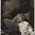Consuelo Kanaga (American, 1894-1978). <em>Frances with a Flower</em>, early 1930s. Gelatin silver photograph, Image: 10 5/8 x 8 in. (27 x 20.3 cm). Brooklyn Museum, Gift of Wallace B. Putnam from the Estate of Consuelo Kanaga, 82.65.10 (Photo: Brooklyn Museum, 82.65.10_SL1_edited.jpg)
