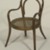 Gebrüder Thonet. <em>Child's Armchair</em>, ca. 1875. Copper beech, modern caning, metal screws, 24 3/4 x 14 x 17 1/4 in. (62.9 x 35.6 x 43.8 cm). Brooklyn Museum, Gift of Dr. Barry R. Harwood, 83.155. Creative Commons-BY (Photo: Brooklyn Museum, 83.155_reference_SL1.jpg)