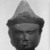  <em>Head of a Deity</em>, 12th century. Stone, 4 3/4 x 3 1/2 in. (12.1 x 8.9 cm). Brooklyn Museum, Gift of Joseph Barrios, 83.178.1. Creative Commons-BY (Photo: Brooklyn Museum, 83.178.1_bw.jpg)