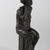 Rhoda Sherbell (American, born 1930). <em>Old Woman Grieving</em>, 1960. Bronze, 14 1/2 x 5 x 7 1/2 in. (36.8 x 12.7 x 19.1 cm). Brooklyn Museum, Gift of Mr. and Mrs. Herbert Irving, 84.211. © artist or artist's estate (Photo: Brooklyn Museum, 84.211_threequarter_PS20.jpg)