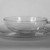 Wilhelm Wagenfeld (1900-1990). <em>Cup and Saucer</em>, 1930-1934. Clear heat-resistant glass, 1 3/8 x 5 1/8 x 3 7/8 in. (3.5 x 13 x 9.8 cm). Brooklyn Museum, Gift of Barry Friedman, 84.64.6a-b. Creative Commons-BY (Photo: Brooklyn Museum, 84.64.6a-b_bw.jpg)