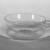 Wilhelm Wagenfeld (1900-1990). <em>Cup and Saucer</em>, 1930-1934. Clear heat-resistant glass, 1 3/8 x 5 1/8 x 3 7/8 in. (3.5 x 13 x 9.8 cm). Brooklyn Museum, Gift of Barry Friedman, 84.64.8a-b. Creative Commons-BY (Photo: Brooklyn Museum, 84.64.8_bw.jpg)