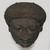  <em>Face from the Lid of a Sarcophagus</em>, ca. 1336-1250 B.C.E. Sandstone, 18 × 17 × 5 in. (45.7 × 43.2 × 12.7 cm). Brooklyn Museum, Charles Edwin Wilbour Fund, 85.166. Creative Commons-BY (Photo: , 85.166_PS9.jpg)
