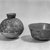 Nazca. <em>Effigy Vessel</em>, 200-700 C.E. Ceramic, bichrome slip, 5 11/16 x 2 15/16 x 7 1/16in. (14.4 x 7.5 x 17.9cm). Brooklyn Museum, Gift of the Ernest Erickson Foundation, Inc., 86.224.54. Creative Commons-BY (Photo: , 86.224.54_70.177.43_acetate_bw.jpg)