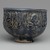 Hasan Al-Qashani. <em>Octagonal Bowl with Inscriptions</em>, late 12th century. Ceramic; fritware, with carved and molded decoration under a cobalt blue glaze, 4 5/16 x 6 3/8 in. (11 x 16.2 cm). Brooklyn Museum, Gift of the Ernest Erickson Foundation, Inc., 86.227.89. Creative Commons-BY (Photo: Brooklyn Museum, 86.227.89_side1_PS2.jpg)