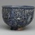 Hasan Al-Qashani. <em>Octagonal Bowl with Inscriptions</em>, late 12th century. Ceramic; fritware, with carved and molded decoration under a cobalt blue glaze, 4 5/16 x 6 3/8 in. (11 x 16.2 cm). Brooklyn Museum, Gift of the Ernest Erickson Foundation, Inc., 86.227.89. Creative Commons-BY (Photo: Brooklyn Museum, 86.227.89_side4_PS2.jpg)