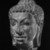  <em>Head of Buddha</em>, 8th century. Sandstone, 12 1/2 x 7 1/2 x 7 3/4 in. (31.8 x 19.1 x 19.7 cm). Brooklyn Museum, Gift of Mr. and Mrs. Robert L. Poster, 86.274. Creative Commons-BY (Photo: Brooklyn Museum, 86.274_threequarter_bw.jpg)
