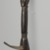 Feia Tomekpa (Dan, flourished 1940s-early 1950s). <em>Ceremonial Hoe</em>, 20th century. Wood, iron, 15 × 2 × 4 1/4 × 8 in. (38.1 × 5.1 × 10.8 × 20.3 cm). Brooklyn Museum, Gift of Mr. and Mrs. Brian S. Leyden, 87.216.2. Creative Commons-BY (Photo: Brooklyn Museum, 87.216.2_threequarter_PS6.jpg)