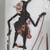 <em>Shadow Play Figure (Wayang kulit)</em>, before 1893. Leather, pigment, wood, fiber, hair, 20 11/16 × 9 5/8 in. (52.5 × 24.5 cm). Brooklyn Museum, Brooklyn Museum Collection, 00.155. Creative Commons-BY (Photo: , CUR.00.155_overall.jpg)