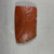  <em>Arretine Sherd</em>, 100 B.C.E.-100 C.E. Clay, slip, 2 5/16 × 9/16 × 4 1/16 in. (5.8 × 1.5 × 10.3 cm). Brooklyn Museum, By exchange, 00.58. Creative Commons-BY (Photo: Brooklyn Museum, CUR.00.58_view02.jpeg)