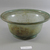 Roman. <em>Bowl of Molded Green Glass</em>, 1st-5th century C.E. Glass, 3 1/2 x Diam. 8 1/4 in. (8.9 x 20.9 cm). Brooklyn Museum, Gift of Robert B. Woodward, 01.105. Creative Commons-BY (Photo: Brooklyn Museum, CUR.01.105_view1.jpg)