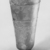 Roman. <em>Beaker</em>, 4th-6th century C.E. Glass, 3 13/16 x greatest diam. 1 15/16 in. (9.7 x 4.9 cm). Brooklyn Museum, Gift of Robert B. Woodward, 01.171. Creative Commons-BY (Photo: Brooklyn Museum, CUR.01.171_negB_bw.jpg)