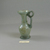 Roman. <em>Jug of Blown Glass</em>, 4th-6th century C.E. Glass, 4 7/16 x 1 3/4 x 2 11/16 in. (11.2 x 4.5 x 6.8 cm). Brooklyn Museum, Gift of Robert B. Woodward, 01.192. Creative Commons-BY (Photo: Brooklyn Museum, CUR.01.192_view2.jpg)