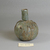Roman. <em>Bottle of Blown Glass</em>, 8th-12th century C.E. Glass, 3 3/16 x Diam. 2 1/2 in. (8.1 x 6.4 cm). Brooklyn Museum, Gift of Robert B. Woodward, 01.249. Creative Commons-BY (Photo: Brooklyn Museum, CUR.01.249.jpg)