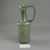 Roman. <em>Jug with Vertical Molded Decoration</em>, 4th century C.E. Glass, 6 11/16 x 2 11/16 x 3 3/4 in. (17 x 6.9 x 9.5 cm). Brooklyn Museum, Gift of Robert B. Woodward, 01.259. Creative Commons-BY (Photo: Brooklyn Museum, CUR.01.259_view1.jpg)