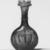 Roman. <em>Bottle of Molded Glass</em>, 1st-5th century C.E. Glass, 5 7/16 x 1 9/16 x 3 1/16 in. (13.8 x 3.9 x 7.7 cm) . Brooklyn Museum, Gift of Robert B. Woodward, 01.285. Creative Commons-BY (Photo: Brooklyn Museum, CUR.01.285_negA_bw.jpg)