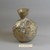 Roman. <em>Bottle of Blown Glass</em>, 3rd-9th century C.E. Glass, 3 1/2 x Diam. 2 15/16 in. (8.9 x 7.4 cm)  . Brooklyn Museum, Gift of Robert B. Woodward, 01.286. Creative Commons-BY (Photo: Brooklyn Museum, CUR.01.286.jpg)