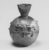 Roman. <em>Bottle of Blown Glass</em>, 3rd-9th century C.E. Glass, 3 1/2 x Diam. 2 15/16 in. (8.9 x 7.4 cm)  . Brooklyn Museum, Gift of Robert B. Woodward, 01.286. Creative Commons-BY (Photo: Brooklyn Museum, CUR.01.286_negA_bw.jpg)