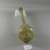 Roman. <em>Bottle of Blown Glass</em>, 4th-5th century C.E. Glass, 11 5/8 x Diam. 2 11/16 in. (29.5 x 6.8 cm)  . Brooklyn Museum, Gift of Robert B. Woodward, 01.373. Creative Commons-BY (Photo: Brooklyn Museum, CUR.01.373_view1.jpg)
