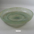 Roman. <em>Shallow Bowl of Molded Green Glass</em>, late 4th century C.E. Glass, 1 15/16 x Diam. 10 5/8 in. (5 x 27 cm). Brooklyn Museum, Gift of Robert B. Woodward, 01.390. Creative Commons-BY (Photo: Brooklyn Museum, CUR.01.390_view1.jpg)
