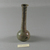 Roman. <em>Bottle of Blown Glass</em>, 1st-early 8th century C.E. Glass, 3 15/16 x Diam. 1 1/2 in. (10 x 3.8 cm). Brooklyn Museum, Gift of Robert B. Woodward, 01.400. Creative Commons-BY (Photo: Brooklyn Museum, CUR.01.400_view3.jpg)