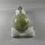 Roman. <em>Bottle of Heavy Mold Glass</em>, 1st-3rd century C.E. Glass, 11 1/4 x Diam. 3 5/16 in. (28.6 x 8.4 cm). Brooklyn Museum, Gift of Robert B. Woodward, 01.414. Creative Commons-BY (Photo: Brooklyn Museum, CUR.01.414_view2.jpg)