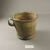 Roman. <em>Cup</em>, 1st century C.E. Glass, 4 5/16 x greatest diam. 5 1/4 in. (11 x 13.3 cm). Brooklyn Museum, Gift of Robert B. Woodward, 01.423. Creative Commons-BY (Photo: Brooklyn Museum, CUR.01.423.jpg)