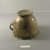 Roman. <em>Cup</em>, 1st century C.E. Glass, 4 3/4 x greatest diam. 6 1/8 in. (12 x 15.6 cm). Brooklyn Museum, Gift of Robert B. Woodward, 01.427. Creative Commons-BY (Photo: Brooklyn Museum, CUR.01.427_bottom.jpg)