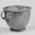 Roman. <em>Cup</em>, 1st century C.E. Glass, 4 3/4 x greatest diam. 6 1/8 in. (12 x 15.6 cm). Brooklyn Museum, Gift of Robert B. Woodward, 01.427. Creative Commons-BY (Photo: Brooklyn Museum, CUR.01.427_negA_bw.jpg)