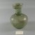 Roman. <em>Bottle of Blown Green Glass</em>, 1st-5th century C.E. Glass, 4 5/16 x Diam. 3 3/8 in. (10.9 x 8.6 cm). Brooklyn Museum, Gift of Robert B. Woodward, 01.432. Creative Commons-BY (Photo: Brooklyn Museum, CUR.01.432_view1.jpg)