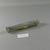 Roman. <em>Elongated Bottle with Folded Body Decoration</em>, 1st-5th century C.E. Glass, 4 3/4 x Diam. 15/16 in. (12 x 2.4 cm). Brooklyn Museum, Gift of Robert B. Woodward, 01.459. Creative Commons-BY (Photo: Brooklyn Museum, CUR.01.459_view2.jpg)