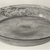 Roman. <em>Shallow Dish of Pale Green Glass</em>, late 4th century C.E. Glass, 1 1/16 x Diam. 6 15/16 in. (2.7 x 17.7 cm). Brooklyn Museum, Gift of Robert B. Woodward, 01.70. Creative Commons-BY (Photo: Brooklyn Museum, CUR.01.70_negA_bw.jpg)