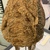  <em>Mask (Tatanua)</em>, 19th century. Wood, rattan, barkcloth, fiber, tapestry turban snail (Turbo petholatus) opercula, seeds, pigment, 21 × 10 × 14 in. (53.3 × 25.4 × 35.6 cm). Brooklyn Museum, Brooklyn Museum Collection, 01.74. Creative Commons-BY (Photo: , CUR.01.74_detail12.jpg)