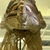  <em>Mask (Tatanua)</em>, 19th century. Wood, rattan, barkcloth, fiber, tapestry turban snail (Turbo petholatus) opercula, seeds, pigment, 21 × 10 × 14 in. (53.3 × 25.4 × 35.6 cm). Brooklyn Museum, Brooklyn Museum Collection, 01.74. Creative Commons-BY (Photo: , CUR.01.74_detail15.jpg)
