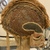  <em>Mask (Tatanua)</em>, 19th century. Wood, rattan, barkcloth, fiber, tapestry turban snail (Turbo petholatus) opercula, seeds, pigment, 21 × 10 × 14 in. (53.3 × 25.4 × 35.6 cm). Brooklyn Museum, Brooklyn Museum Collection, 01.74. Creative Commons-BY (Photo: , CUR.01.74_right.jpg)