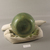 Roman. <em>Vase of Heavy Molded Green Glass</em>, 1st-5th century C.E. Glass, 6 1/8 x Diam. 5 11/16 in. (15.5 x 14.4 cm). Brooklyn Museum, Gift of Robert B. Woodward, 01.77. Creative Commons-BY (Photo: Brooklyn Museum, CUR.01.77_bottom.jpg)