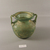 Roman. <em>Vase of Heavy Molded Green Glass</em>, 1st-5th century C.E. Glass, 6 1/8 x Diam. 5 11/16 in. (15.5 x 14.4 cm). Brooklyn Museum, Gift of Robert B. Woodward, 01.77. Creative Commons-BY (Photo: Brooklyn Museum, CUR.01.77_view1.jpg)