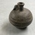  <em>Jar</em>. Clay, slip, 2 7/16 × Diam. 2 5/16 in. (6.2 × 5.8 cm). Brooklyn Museum, Gift of the Egypt Exploration Society, 02.219. Creative Commons-BY (Photo: , CUR.02.219_view01.jpg)