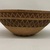Yokuts. <em>Coiled Basketry Bowl</em>, late 19th century. Fiber, 6 × 15 7/8 × 15 7/8 in. (15.2 × 40.3 × 40.3 cm). Brooklyn Museum, Gift of George Foster Peabody, 02.255.2242. Creative Commons-BY (Photo: Brooklyn Museum, CUR.02.255.2242_view01.jpg)