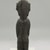 Rapanui. <em>Figure (Moai Tangata)</em>, late 19th century. Wood, shell, obsidian, 7 1/16 x 1 3/4 x 1 3/16 in.  (18 x 4.5 x 3 cm). Brooklyn Museum, Gift of A. Augustus Healy and Carll H. de Silver, 03.215. Creative Commons-BY (Photo: Brooklyn Museum, CUR.03.215_back.jpg)