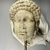 Roman. <em>Head of Apollo</em>, late 1st century B.C.E., probably. Marble, 9 1/16 × 5 5/16 × 7 1/16 in. (23 × 13.5 × 18 cm). Brooklyn Museum, Gift of Carll H. de Silver, 03.285. Creative Commons-BY (Photo: Brooklyn Museum, CUR.03.285_view01-1.jpg)