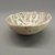 Pueblo (unidentified). <em>Bowl</em>, Probably 900-1100, Pueblo II. Clay, slip, pigment, 1 1/2 x 3 3/4 in. (3.8 x 9.5 cm). Brooklyn Museum, Museum Expedition 1903, Purchased with funds given by A. Augustus Healy and George Foster Peabody, 03.325.10970. Creative Commons-BY (Photo: Brooklyn Museum, CUR.03.325.10970_view1.jpg)