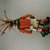 A:shiwi (Zuni Pueblo). <em>Kachina Doll (Kjaweya)</em>, late 19th century. Turquoise, feathers, yarn, wood, cloth, string, pigment, nails, hair, 16 9/16 x 12 15/16in. (42 x 32.8cm). Brooklyn Museum, Museum Expedition 1903, Museum Collection Fund, 03.325.4617. Creative Commons-BY (Photo: Brooklyn Museum, CUR.03.325.4617_back.jpg)