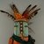 She-we-na (Zuni Pueblo). <em>Kachina Doll (Kjaweya)</em>, late 19th century. Turquoise, feathers, yarn, wood, cloth, string, pigment, nails, hair, 16 9/16 x 12 15/16in. (42 x 32.8cm). Brooklyn Museum, Museum Expedition 1903, Museum Collection Fund, 03.325.4617. Creative Commons-BY (Photo: Brooklyn Museum, CUR.03.325.4617_detail1.jpg)