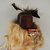She-we-na (Zuni Pueblo). <em>Kachina Doll (Ahuta Shelowa)</em>, late 19th century. Feathers, fur, yarn, cloth, hide, wood, string, pigment, nails, (40.0 x 10.1 x 12.8 cm). Brooklyn Museum, Museum Expedition 1903, Museum Collection Fund, 03.325.4622. Creative Commons-BY (Photo: Brooklyn Museum, CUR.03.325.4622_detail.jpg)