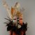 She-we-na (Zuni Pueblo). <em>Kachina Doll (Etetse Pona)</em>, late 19th century. Cotton, hide, metal, wood, cloth, hide, yarn, string, feathers, nails, 15 3/4 [without feathers-15 5/6] x 4 1/8 x 4 1/2 in.  (40 [without feathers-38.9 cm] x 10.5 x 11.4 cm). Brooklyn Museum, Museum Expedition 1903, Museum Collection Fund, 03.325.4625. Creative Commons-BY (Photo: Brooklyn Museum, CUR.03.325.4625_detail.jpg)