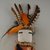 She-we-na (Zuni Pueblo). <em>Kachina Doll (Zum Tsehapa)</em>, late 19th century. Feathers, yarn, wood, cloth, string, hair, pigment, nails, fiber, feathers, 11 13/16 x 2 3/8 x 4 3/16 in.  (30.0 x 6.1 x 10.6 cm). Brooklyn Museum, Museum Expedition 1903, Museum Collection Fund, 03.325.4641. Creative Commons-BY (Photo: Brooklyn Museum, CUR.03.325.4641_detail.jpg)